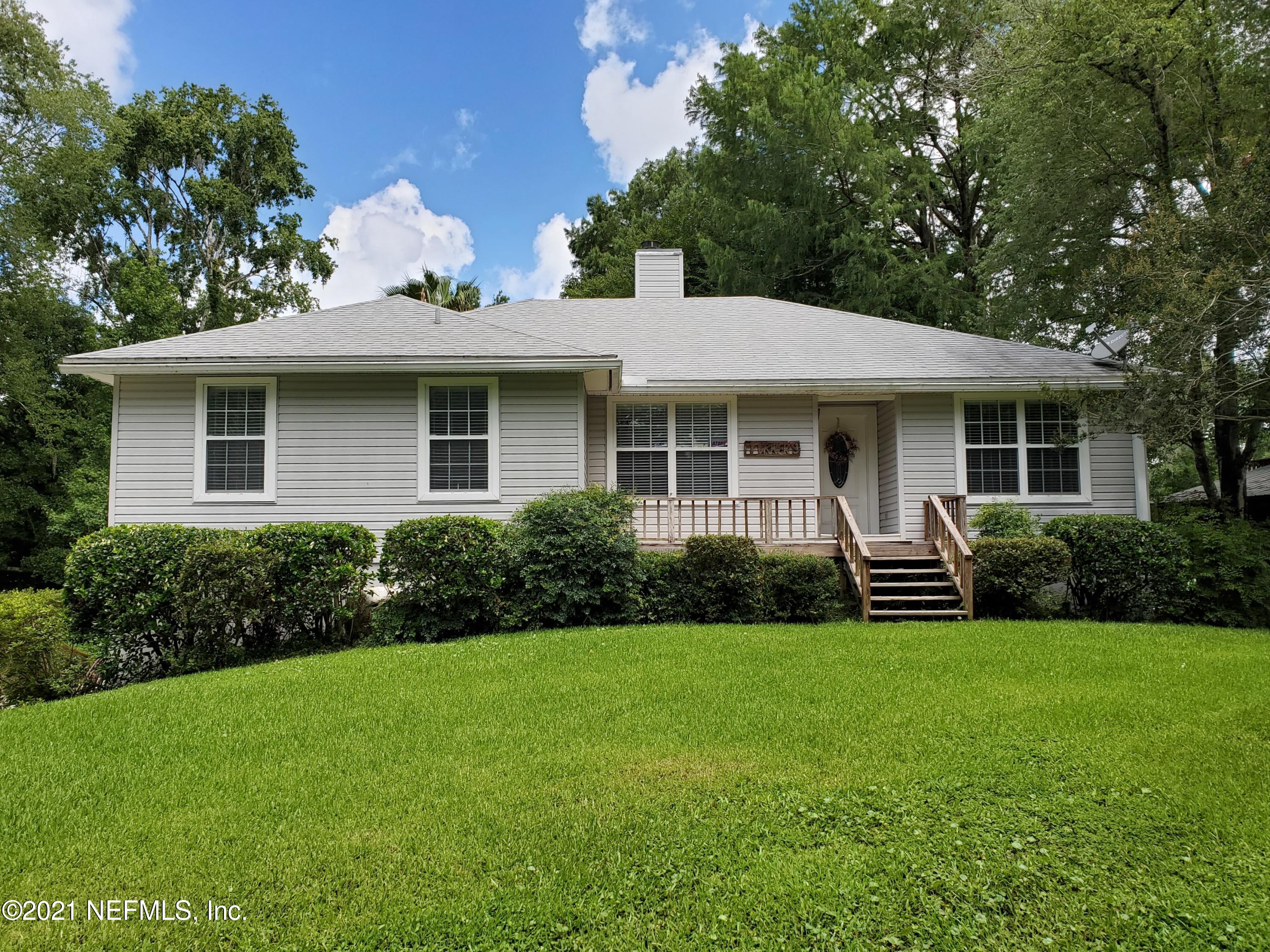 2040 Cornell Road Middleburg, FL 32068 - Photo 1 of 65 a front view of house with yard and green space