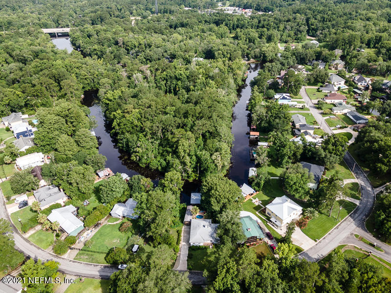 2040 Cornell Road Middleburg, FL 32068 - Photo 63 of 65 an aerial view of residential houses with outdoor space and trees