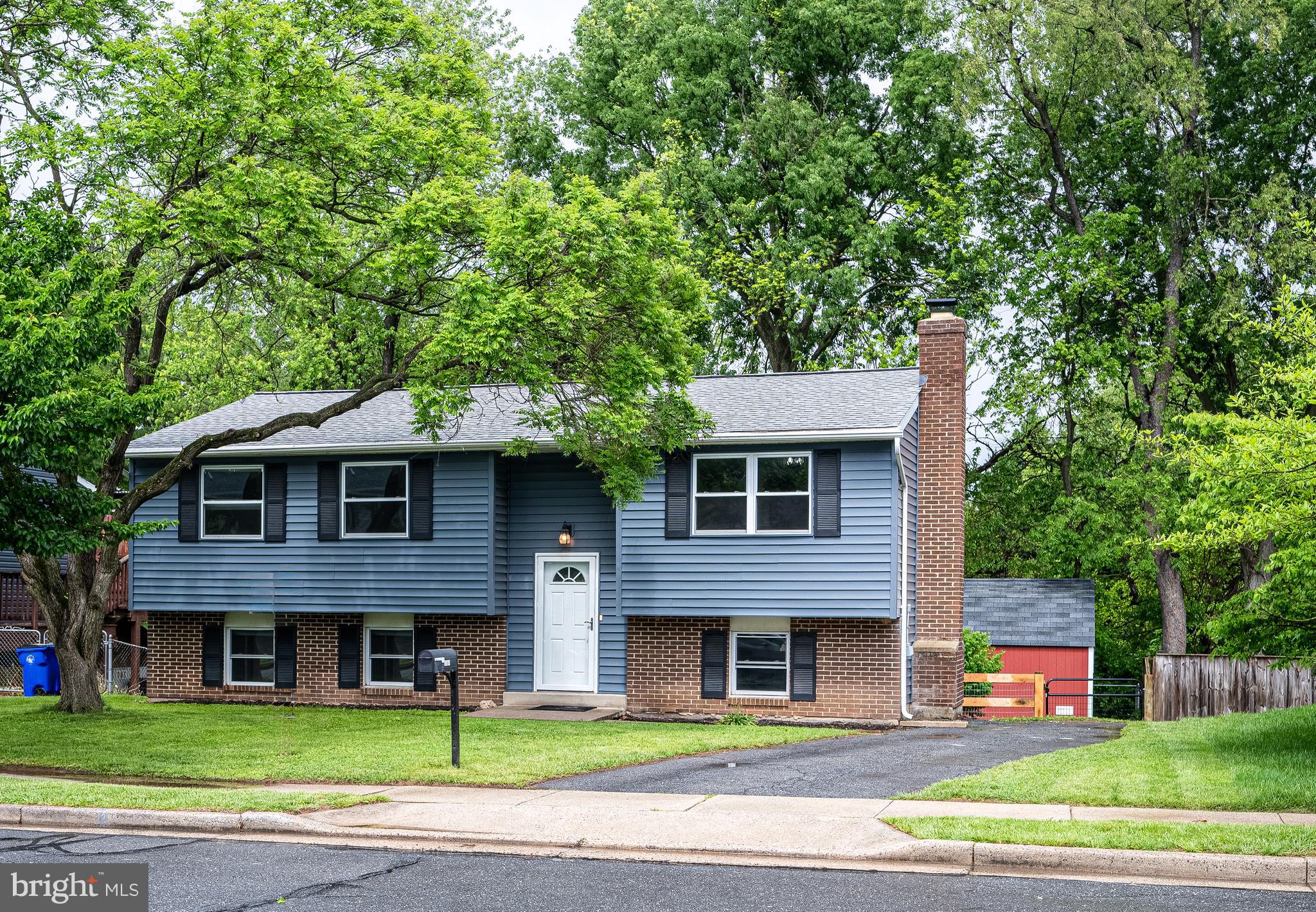 1784 Valleyside Drive Frederick, MD 21702 - Photo 2 of 42 a front view of a house with a garden