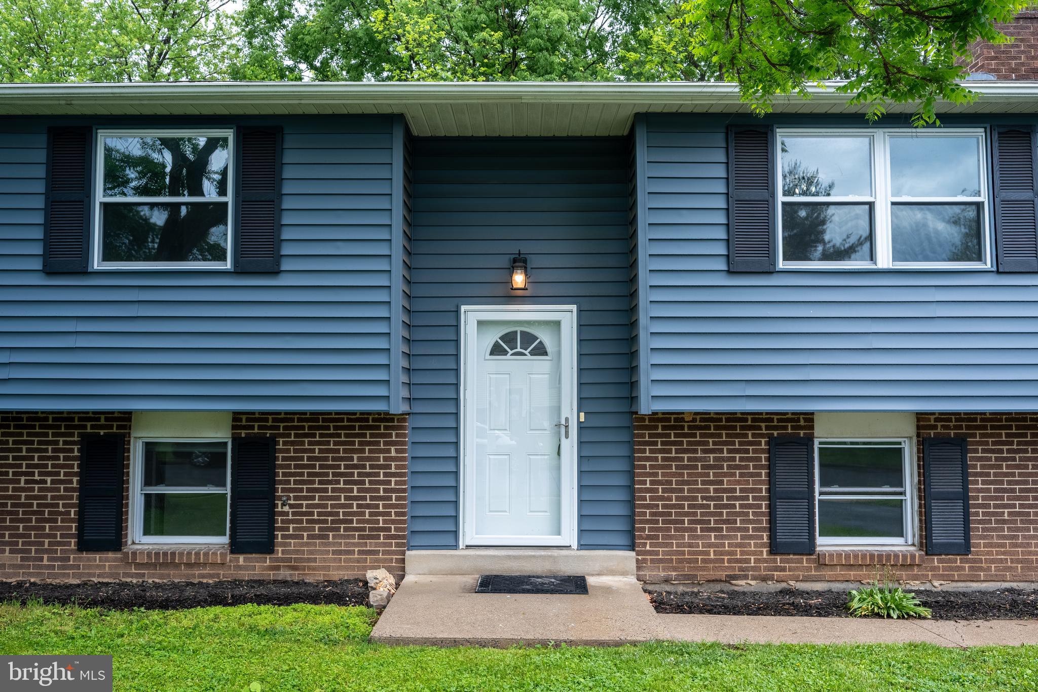 1784 Valleyside Drive Frederick, MD 21702 - Photo 35 of 42 a front view of a house with a yard