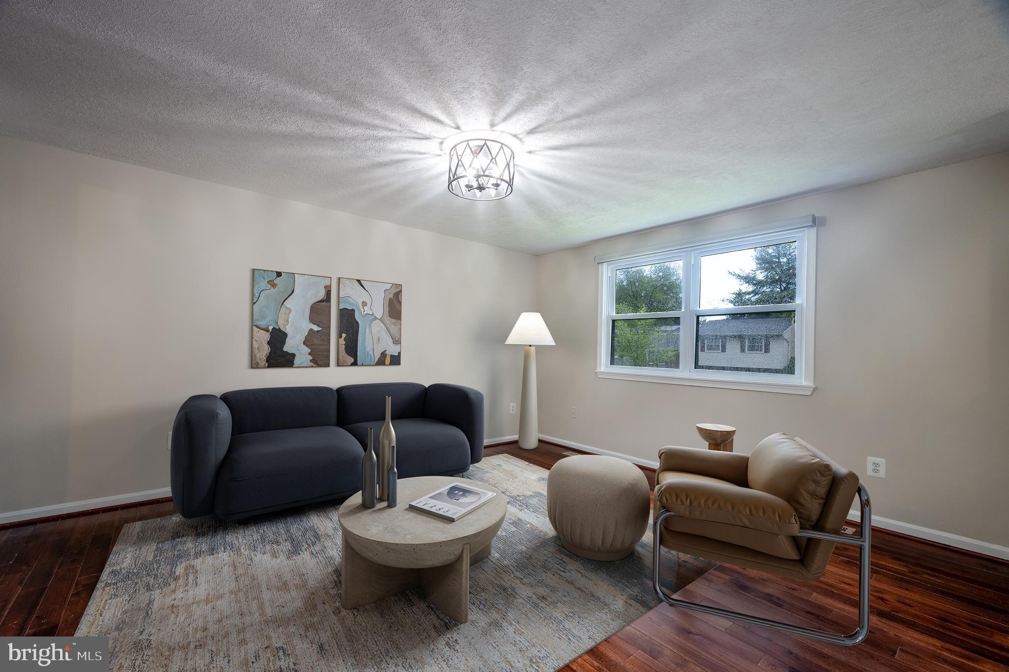 1784 Valleyside Drive Frederick, MD 21702 - Photo 5 of 42 a living room with furniture and a window