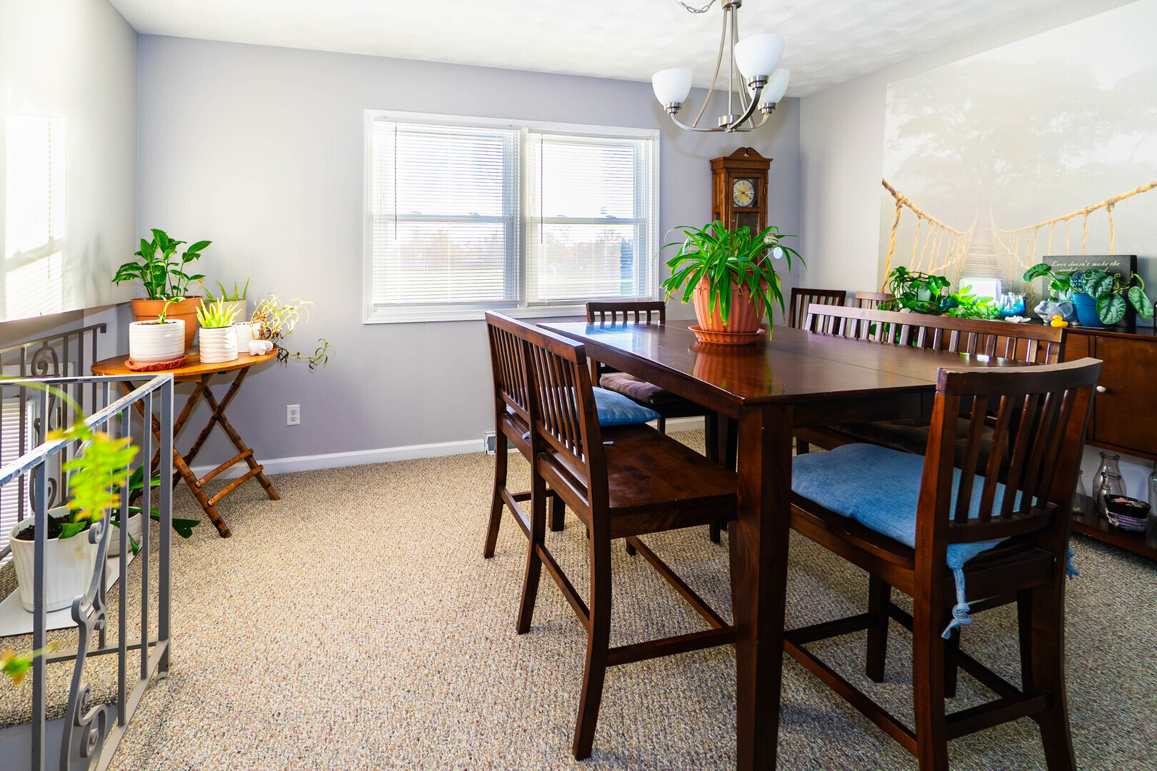1000-1008 Carrie Avenue Rochelle, IL 61068 - Photo 4 of 20 a dining room filled chandelier and a wooden floor