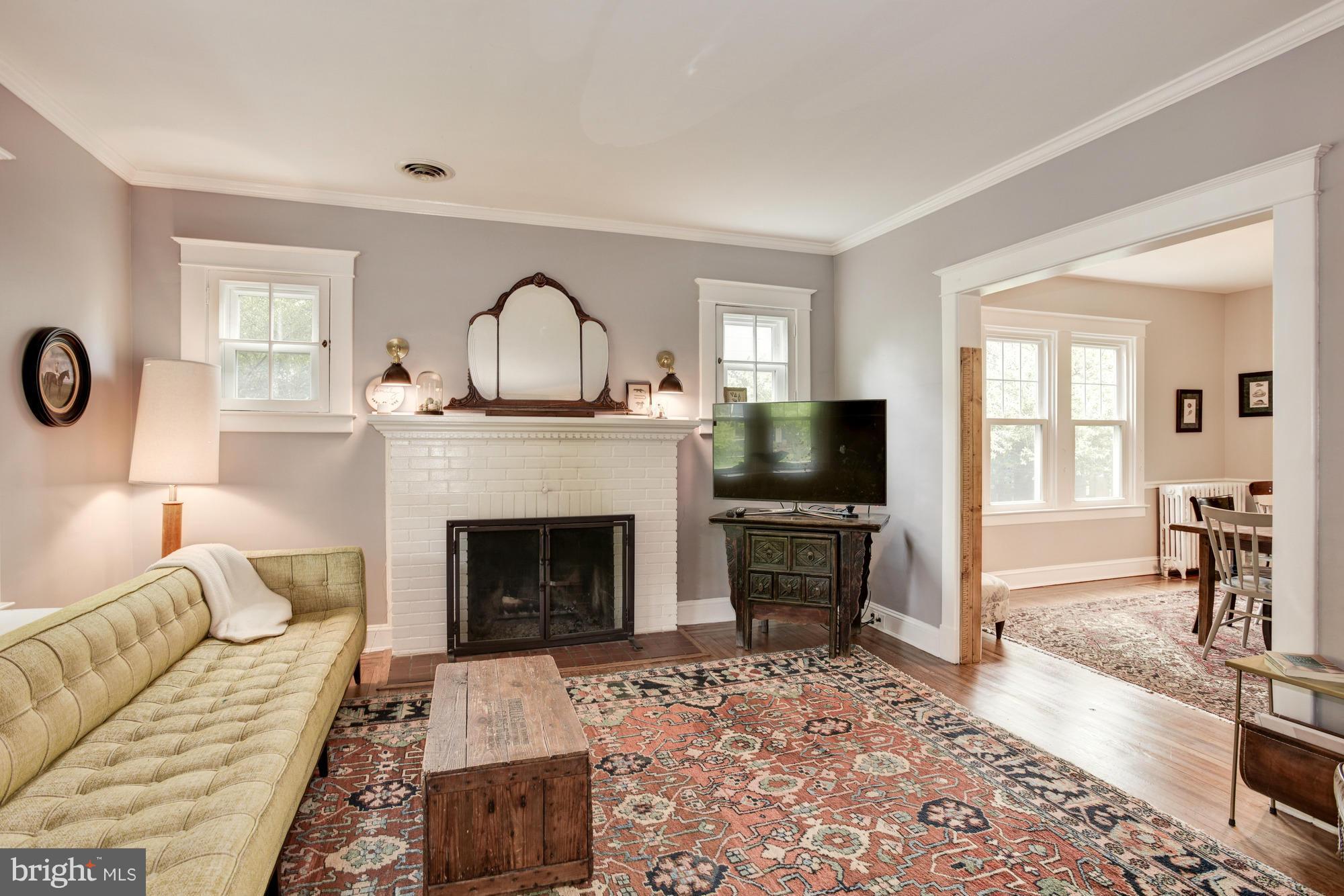 514 Anneslie Road Baltimore, MD 21212 - Photo 5 of 26 Living Room features fireplace, french doors.