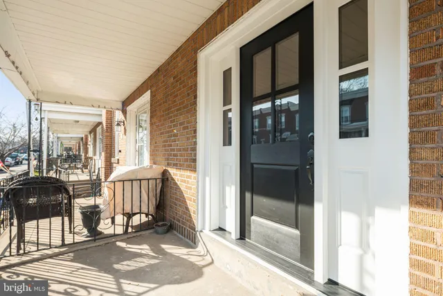 a view of a balcony with wooden floor