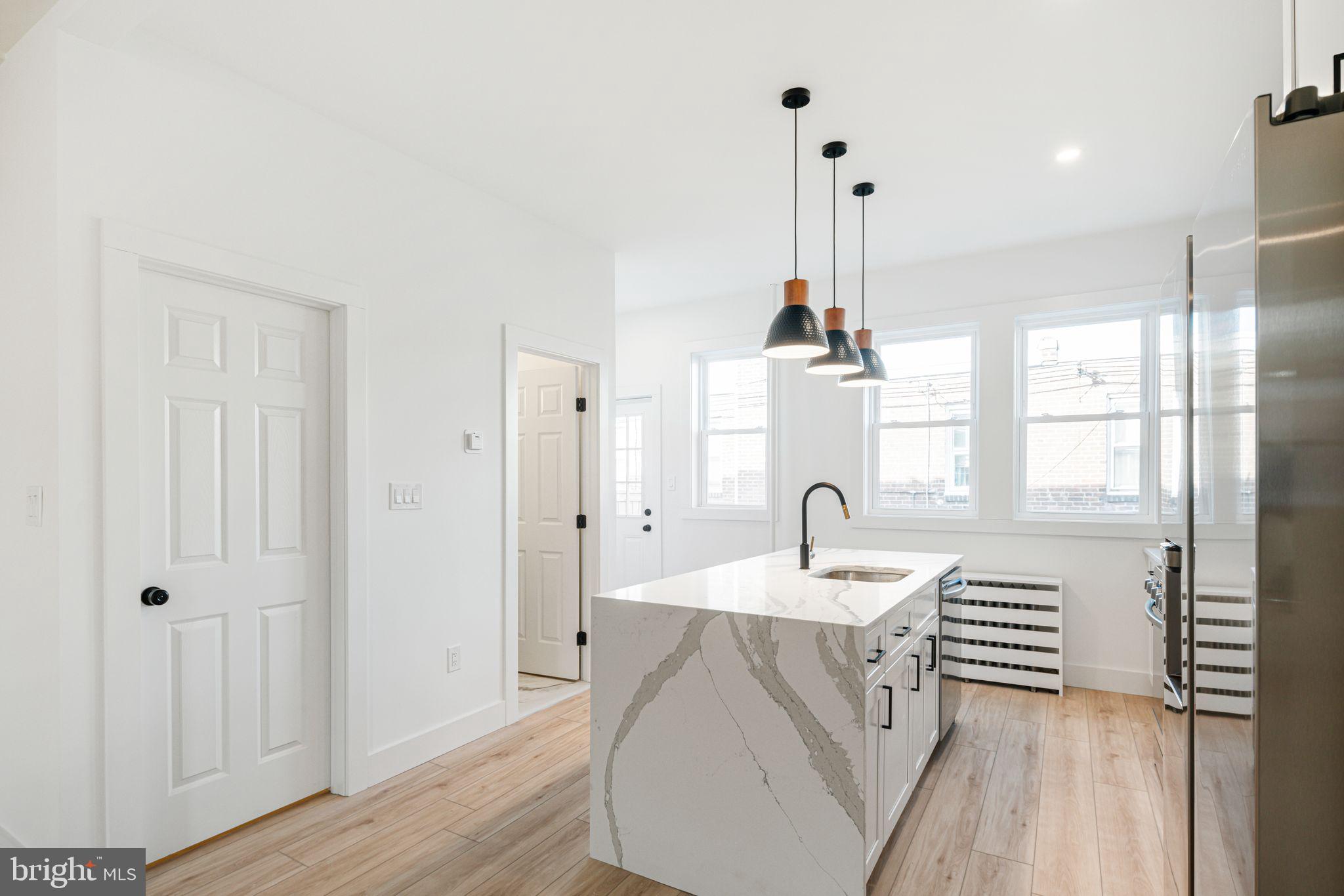 448 Markle Street Philadelphia, PA 19128 - Photo 6 of 21 a very nice looking kitchen with a large window