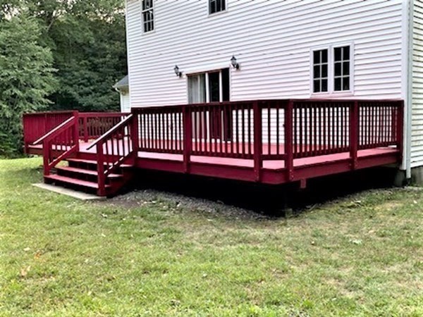 74 Lackey Dam Road Sutton, MA 01590 - Photo 5 of 17 a view of a deck with a yard