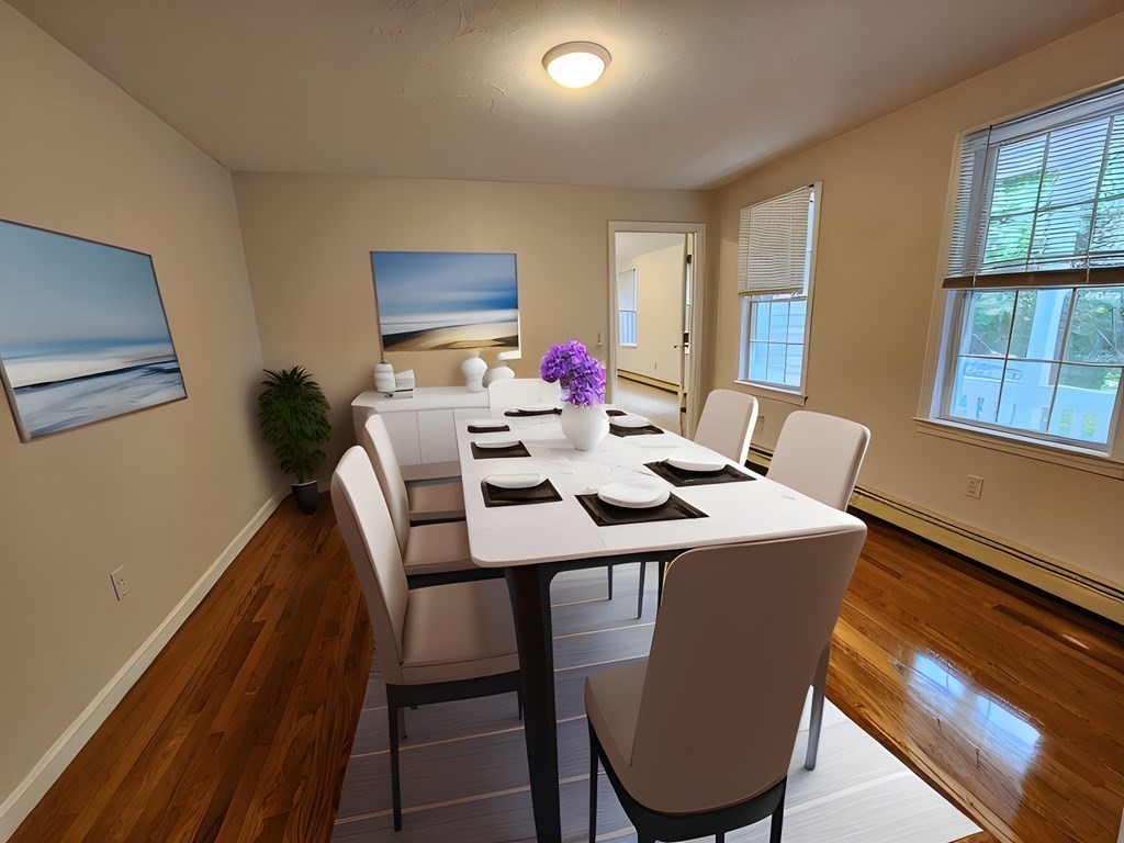 74 Lackey Dam Road Sutton, MA 01590 - Photo 10 of 17 a view of a dining room with furniture window and wooden floor