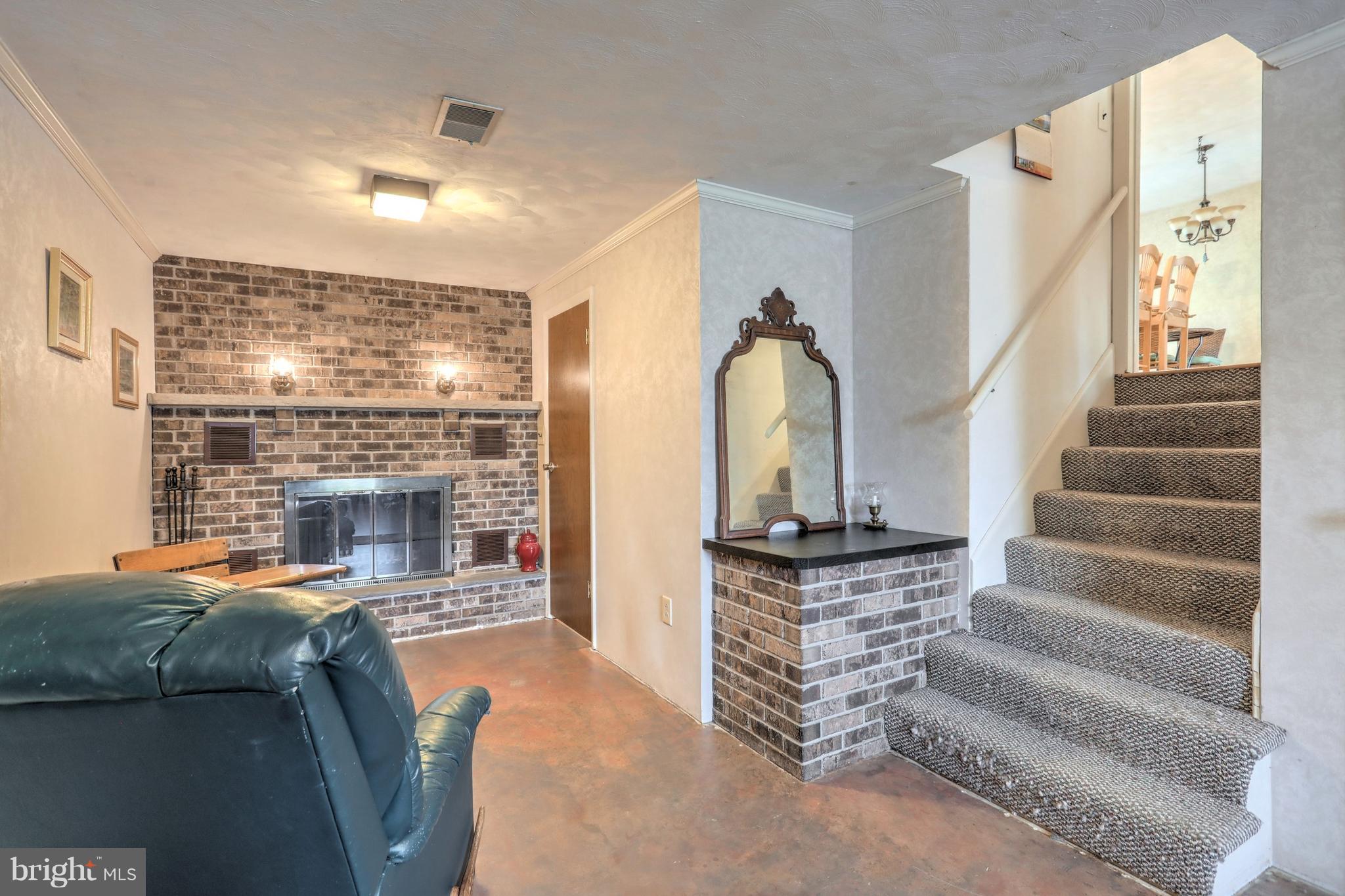 650 Norman Road York, PA 17406 - Photo 19 of 36 Lower Level Family Room w/garage access
