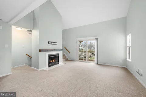 a view of a livingroom with a fireplace