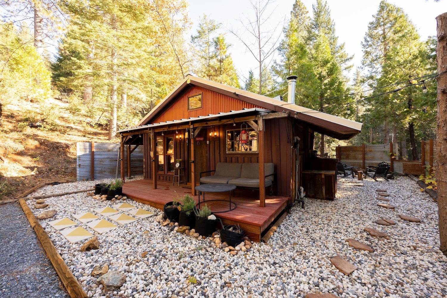 32207 Squire Canyon Lane Colfax, CA 95713 - Photo 1 of 1 a view of a house with a yard and wooden fence