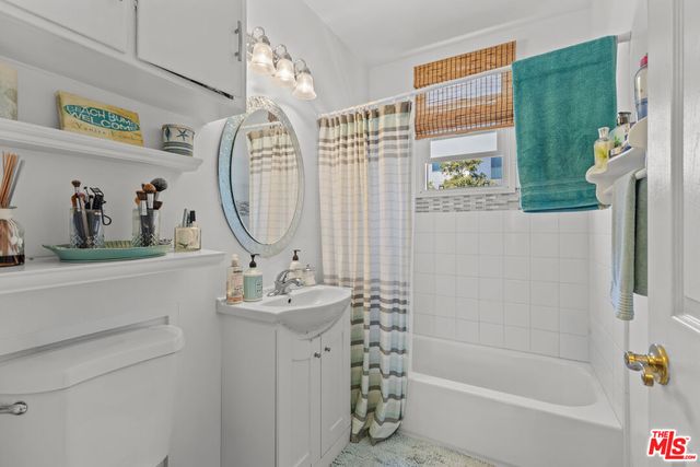 a bathroom with a sink a vanity and a mirror