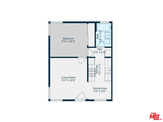 a picture of a bench in front of a wall