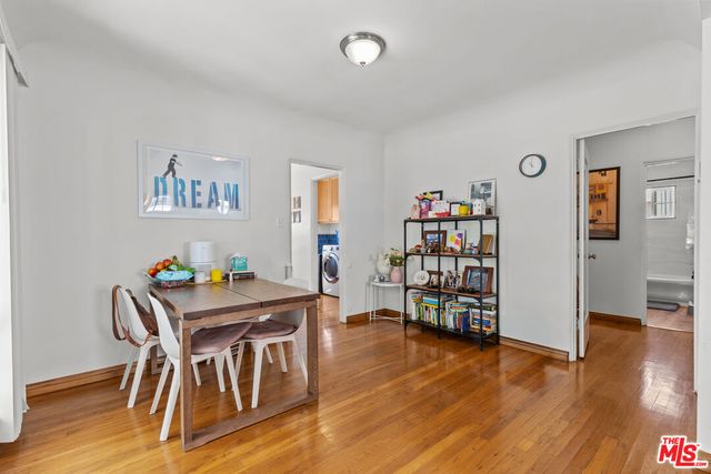 a workspace with furniture and wooden floor