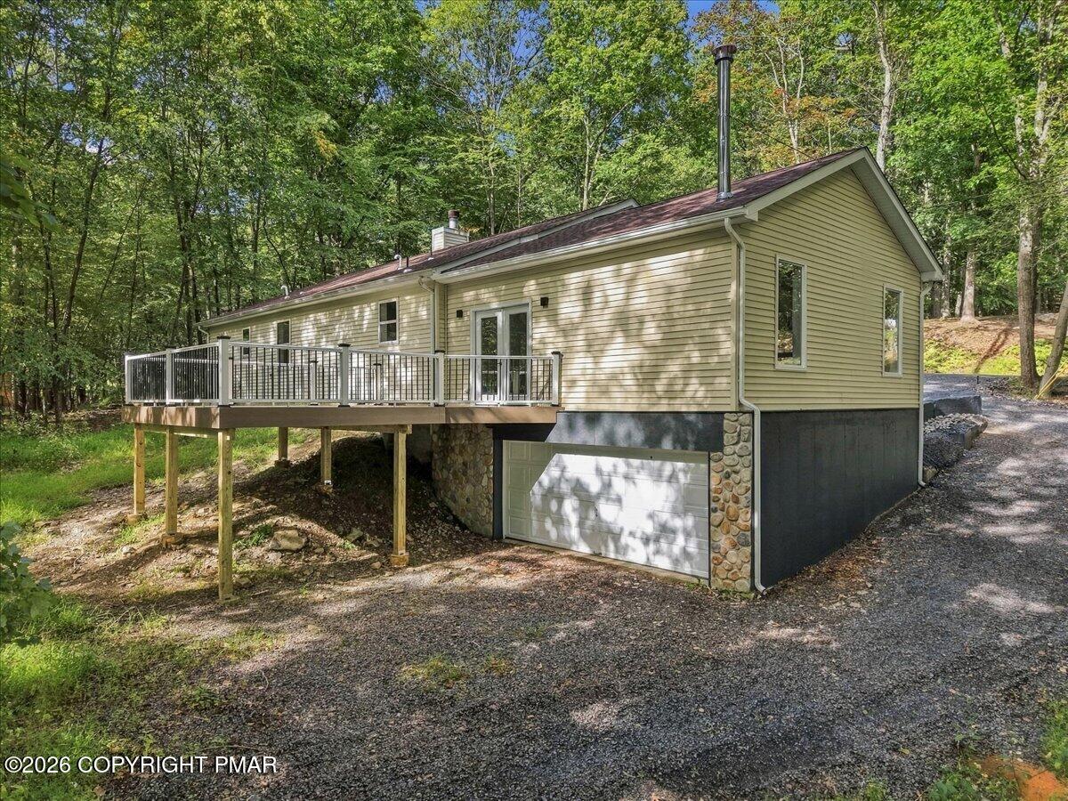 2110 Owl Pass Road Bushkill, PA 18324 - Photo 34 of 40 back/garage