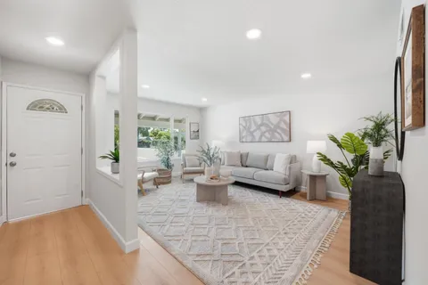 a living room with furniture and a couch