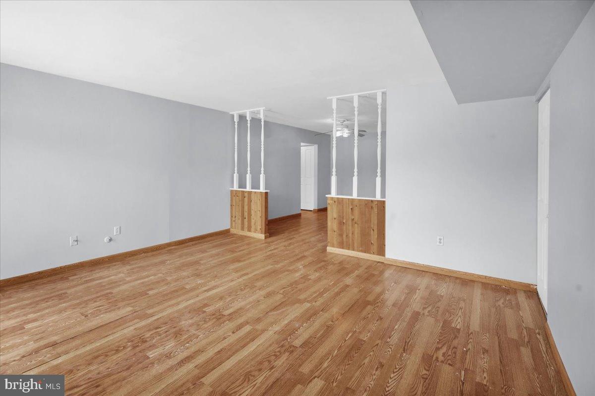 2900 State Hill Road, Unit I11 Reading, PA 19610 - Photo 6 of 22 Spacious room with warm wooden floors.