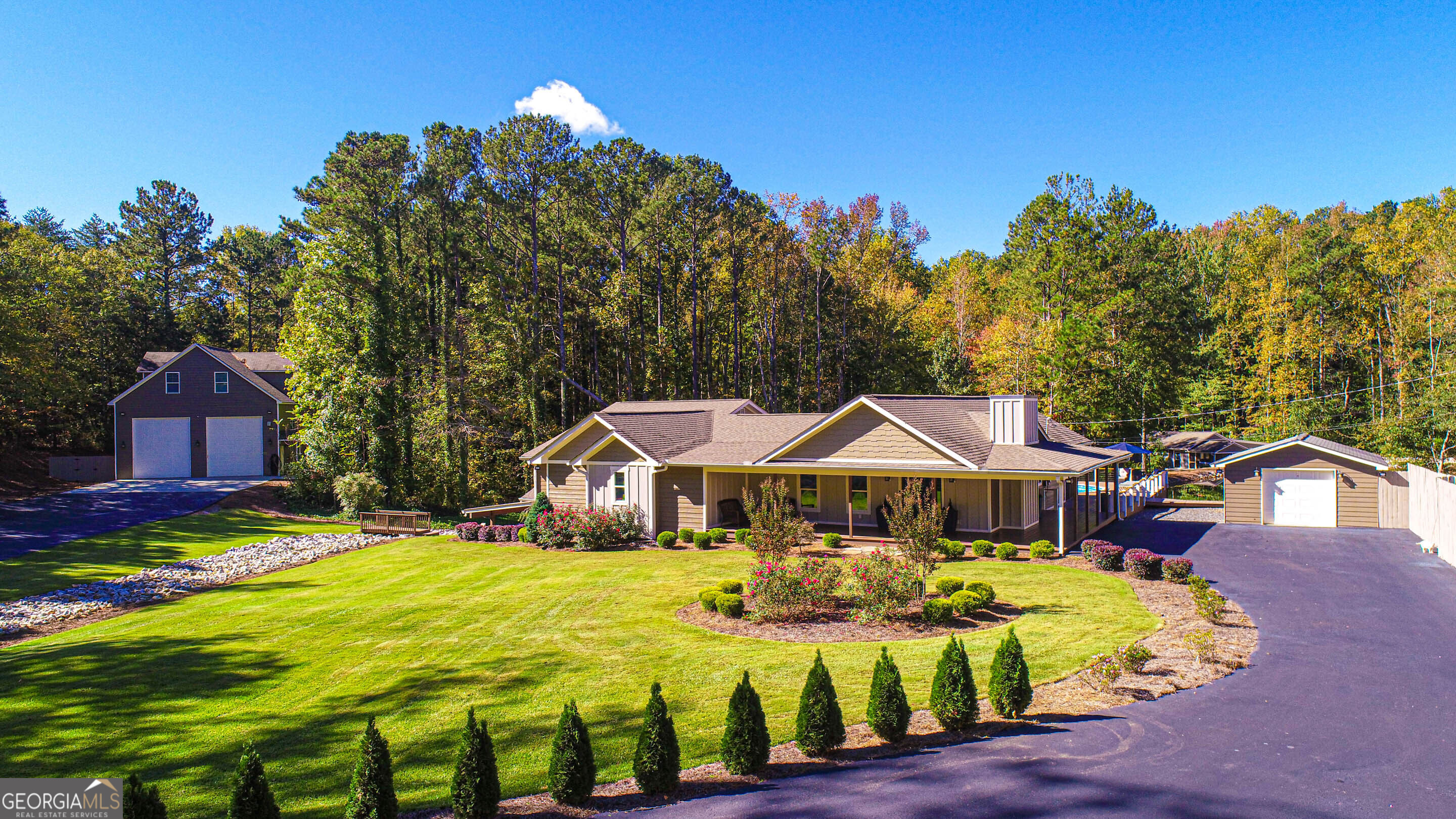1025 Dailey Mill Road McDonough, GA 30253 - Photo 1 of 58 a front view of house with yard outdoor seating and green space