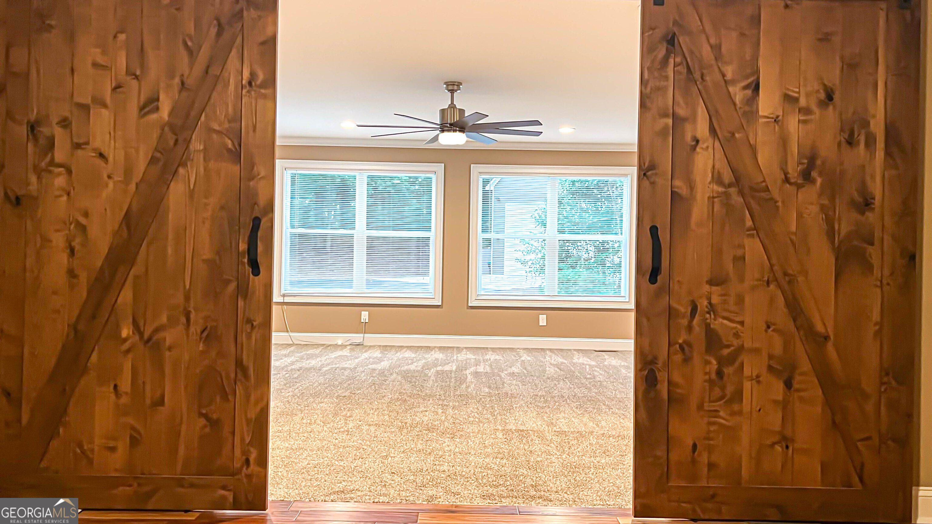 1025 Dailey Mill Road McDonough, GA 30253 - Photo 11 of 58 a view of a windows in the balcony