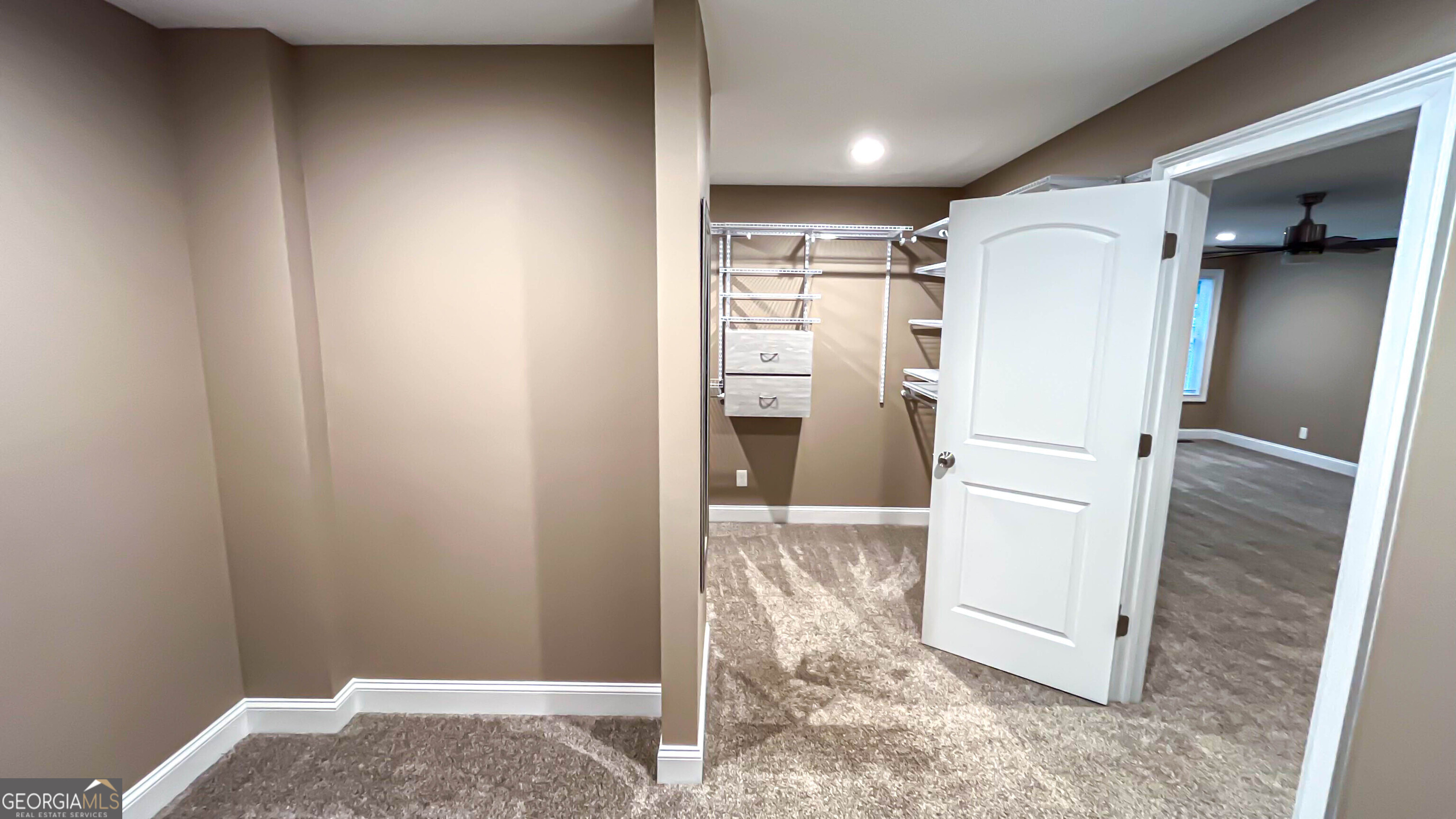1025 Dailey Mill Road McDonough, GA 30253 - Photo 13 of 58 a view of kitchen with refrigerator and white walls