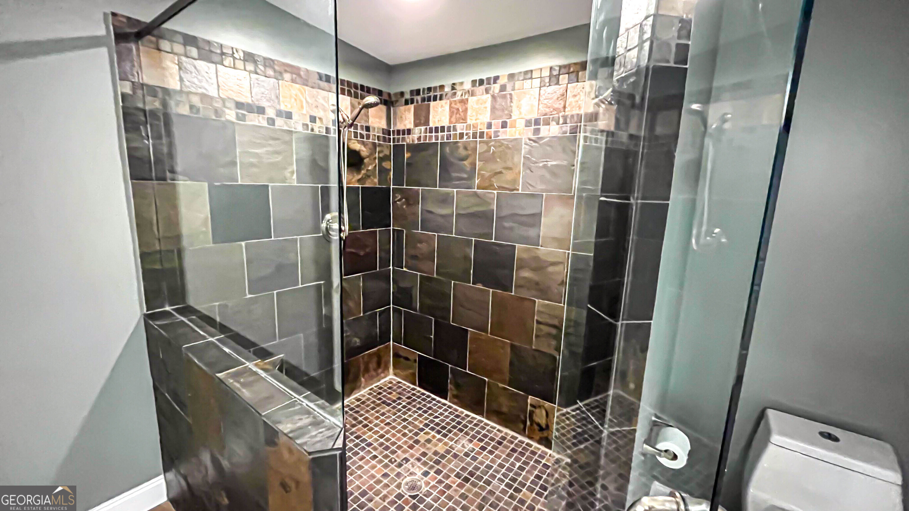 1025 Dailey Mill Road McDonough, GA 30253 - Photo 15 of 58 a bathroom with a shower