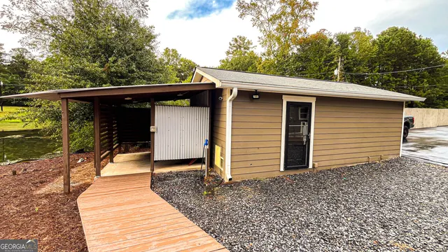 a view of a house with a swimming pool