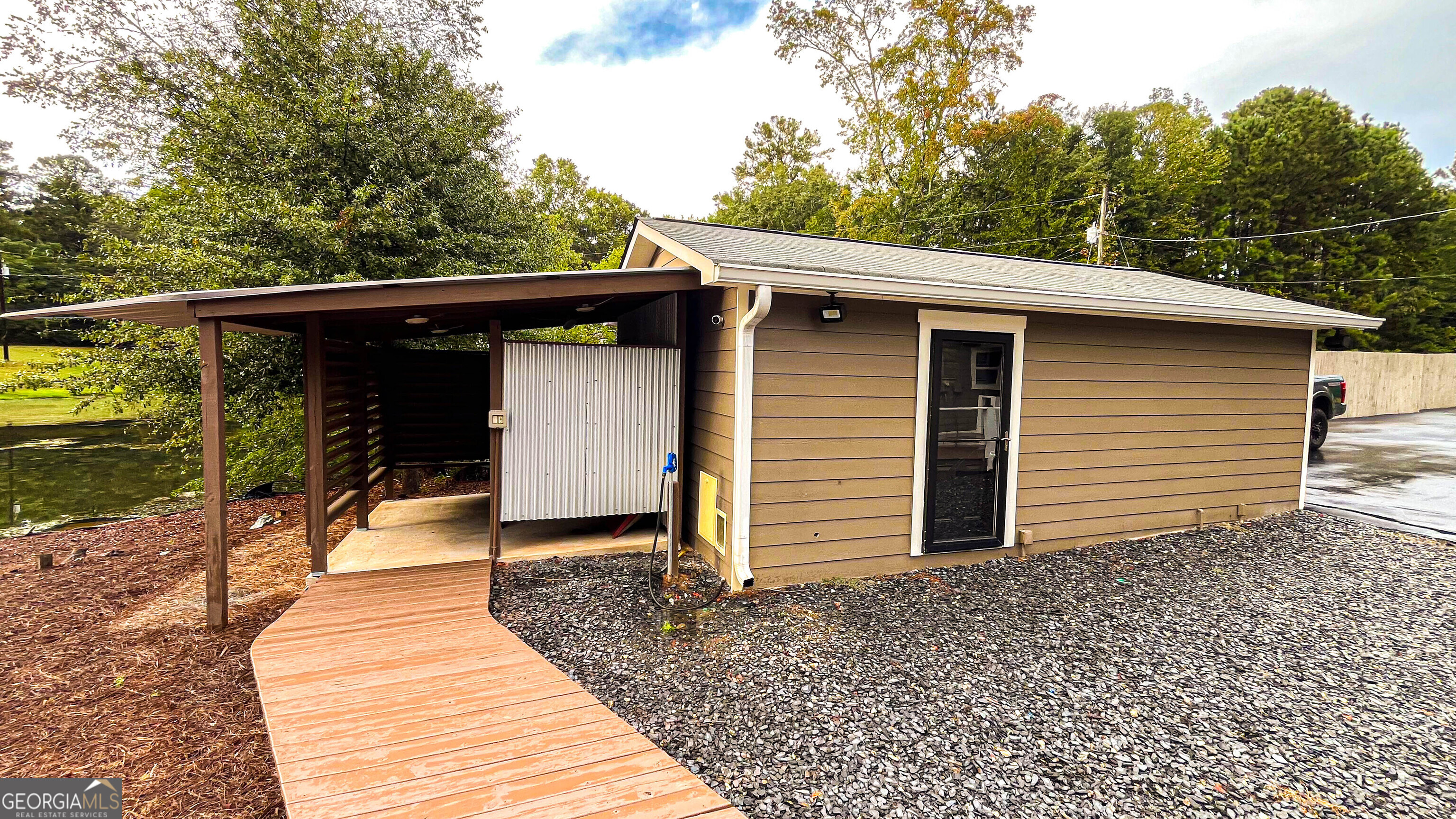 1025 Dailey Mill Road McDonough, GA 30253 - Photo 32 of 58 a front view of a house with a garden