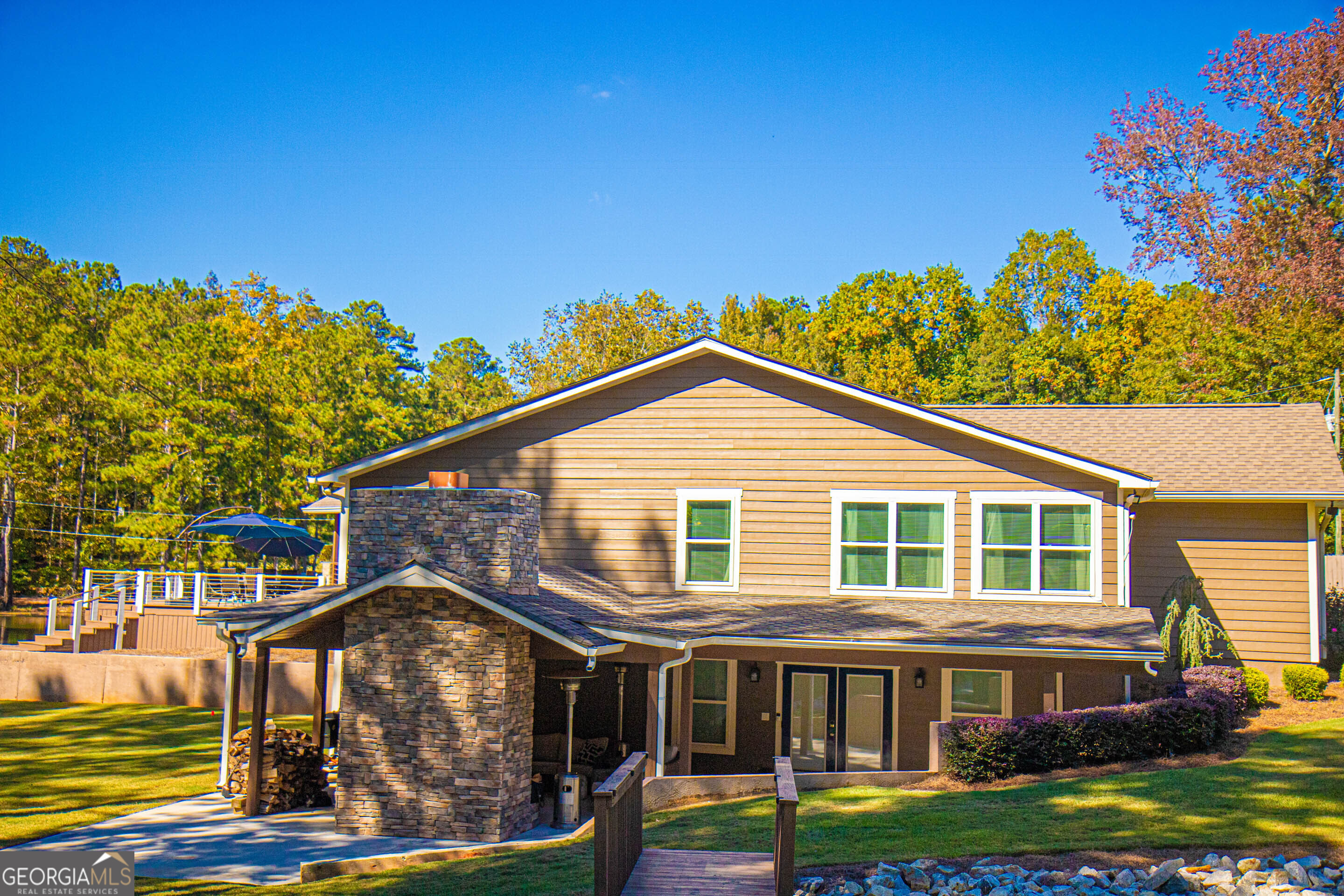 1025 Dailey Mill Road McDonough, GA 30253 - Photo 35 of 58 a front view of a house with garden