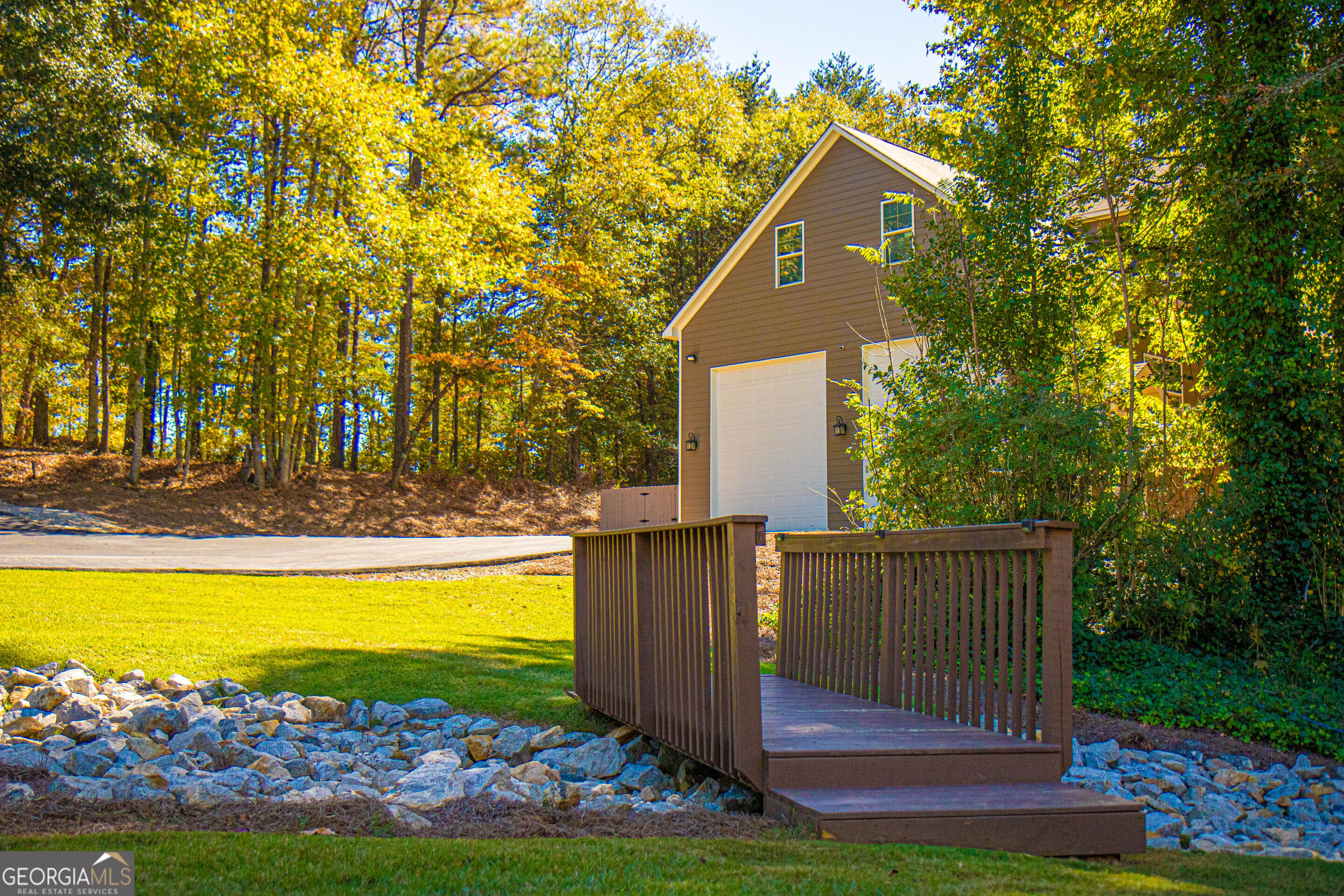 1025 Dailey Mill Road McDonough, GA 30253 - Photo 36 of 58 a view of a house with a swimming pool