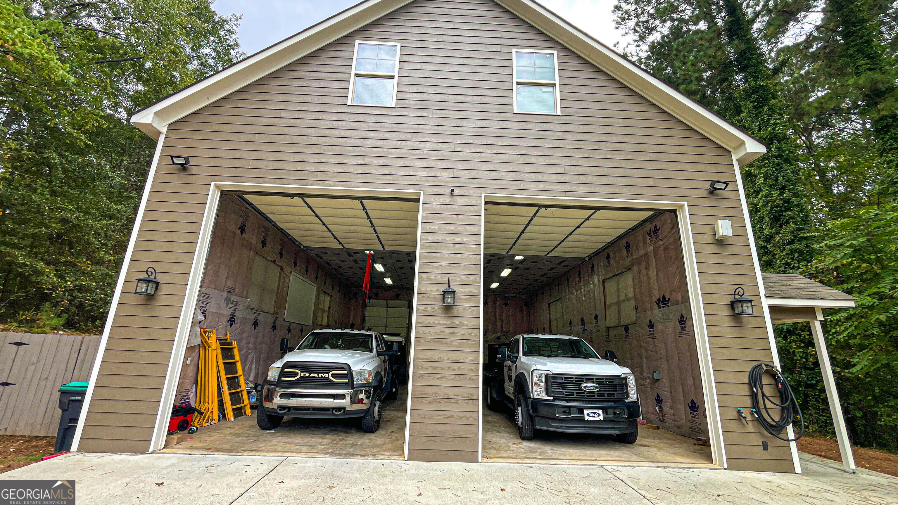 1025 Dailey Mill Road McDonough, GA 30253 - Photo 38 of 58 a view of a car in front of a house