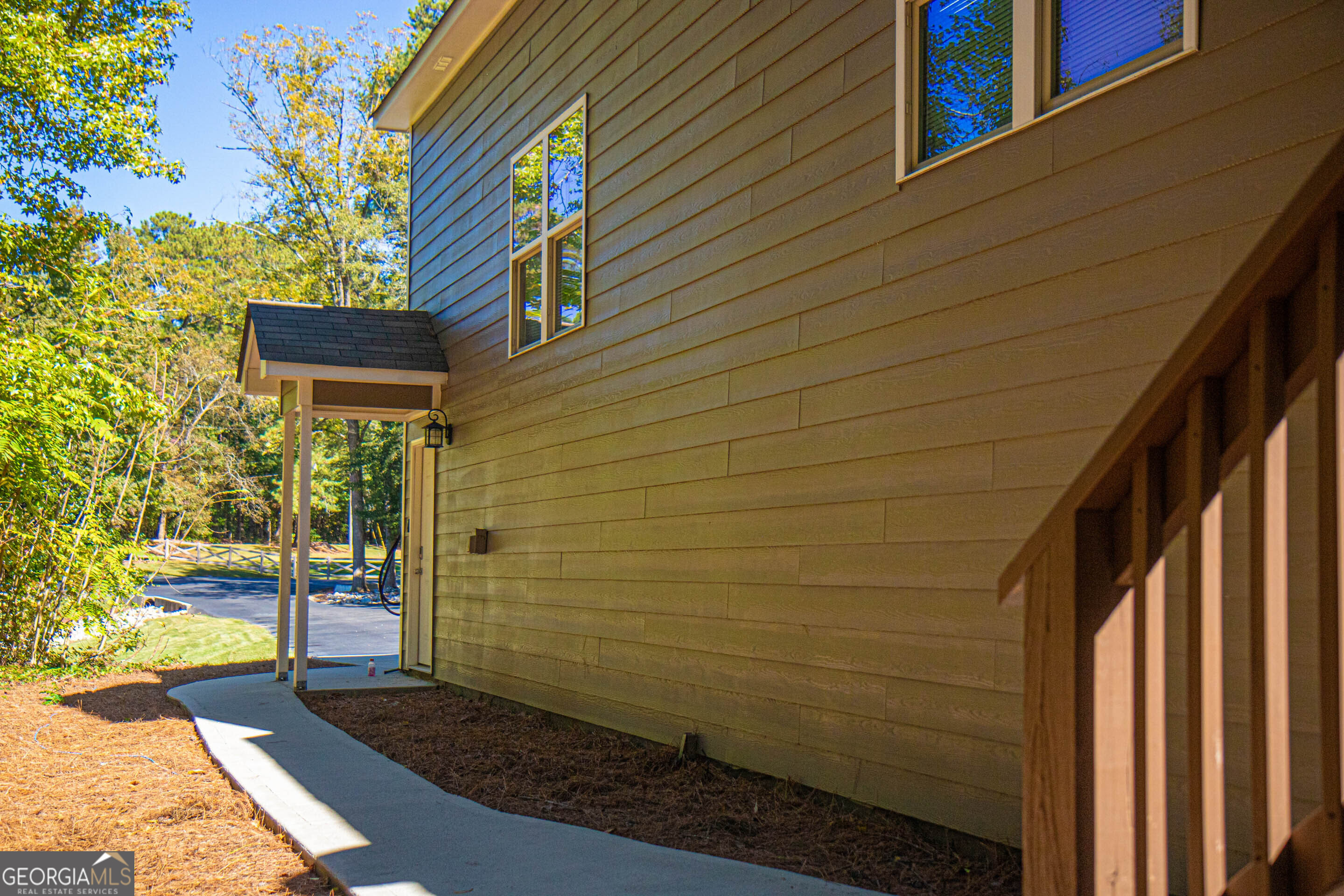 1025 Dailey Mill Road McDonough, GA 30253 - Photo 40 of 58 a view of a door and wooden floor