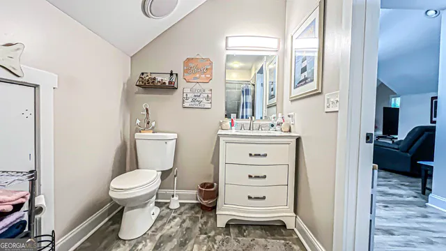 a view of street with parked cars