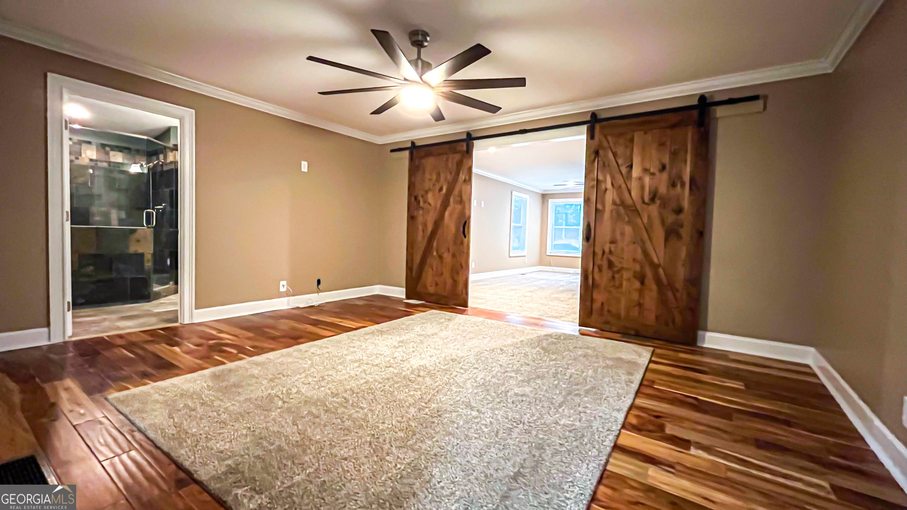 1025 Dailey Mill Road McDonough, GA 30253 - Photo 10 of 58 a bedroom with a bed and a window