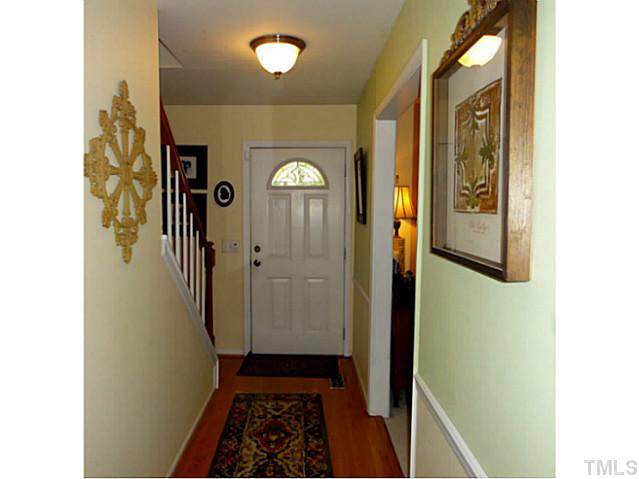 1008 Northclift Drive Raleigh, NC 27609 - Photo 7 of 21 a view of hallway with wooden floor