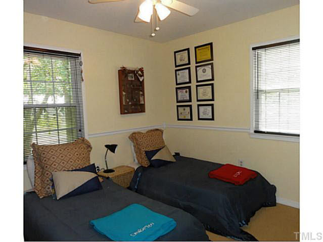 1008 Northclift Drive Raleigh, NC 27609 - Photo 10 of 21 a living room with furniture and a window