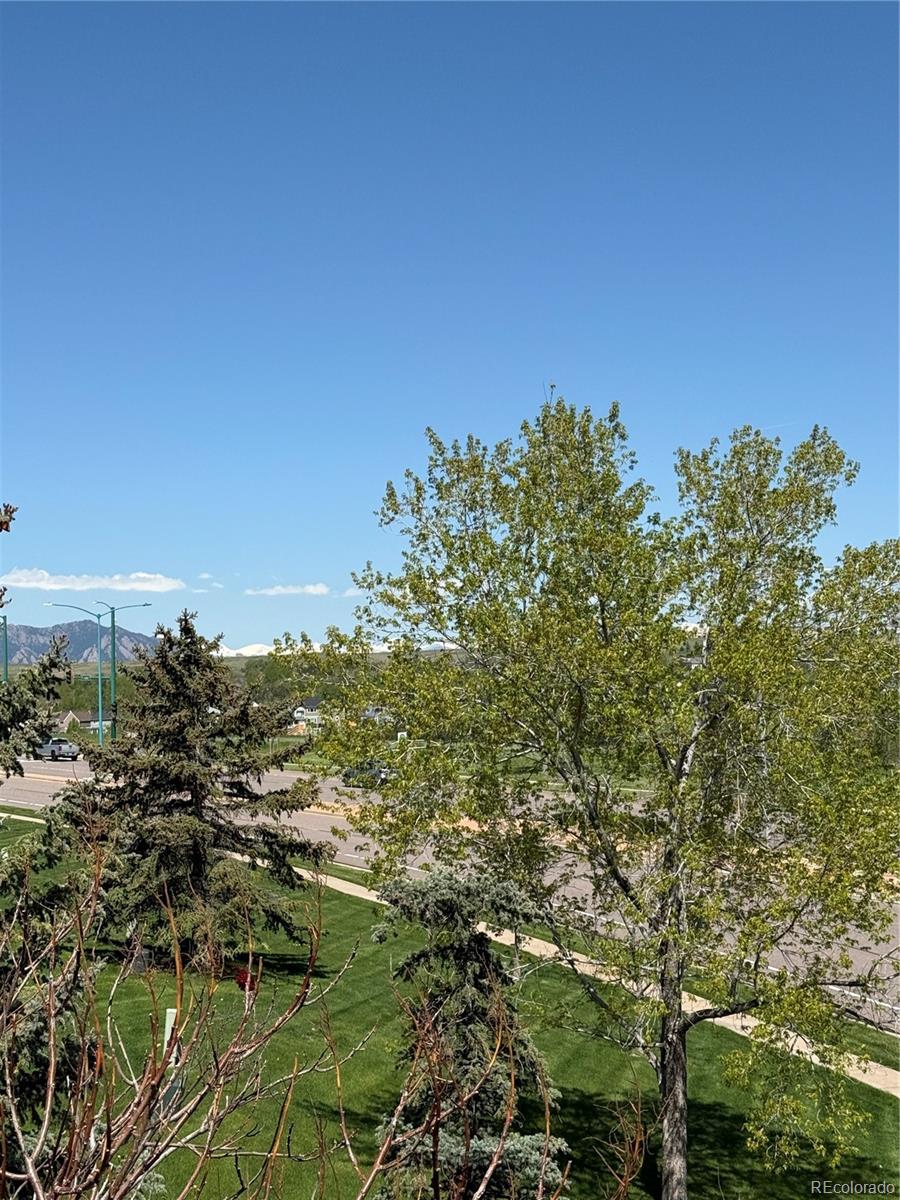 2855 Rock Creek Circle, Unit 129 Louisville, CO 80027 - Photo 15 of 45 a view of a lake