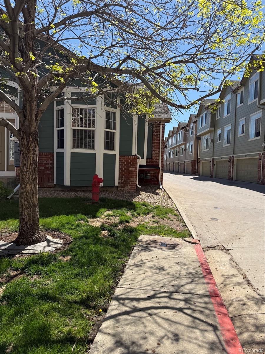 2855 Rock Creek Circle, Unit 129 Louisville, CO 80027 - Photo 2 of 45 a view of a backyard with plants