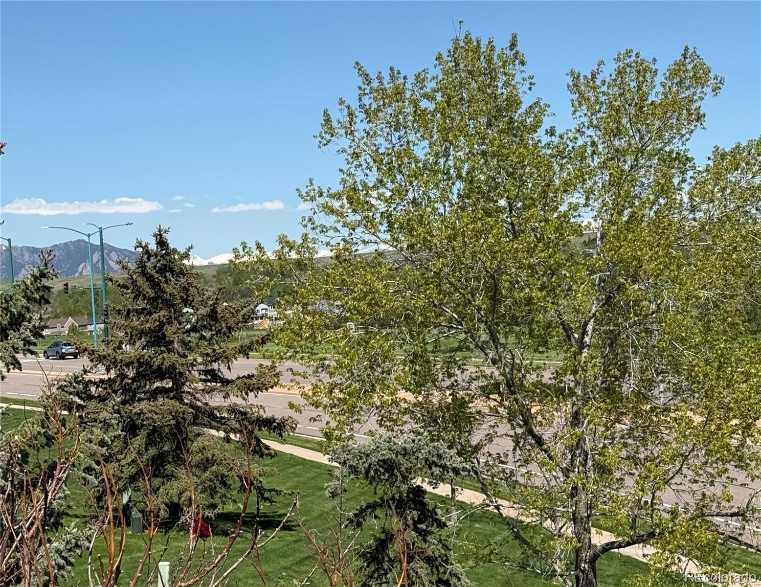 2855 Rock Creek Circle, Unit 129 Louisville, CO 80027 - Photo 3 of 45 a view of a tree with a tree