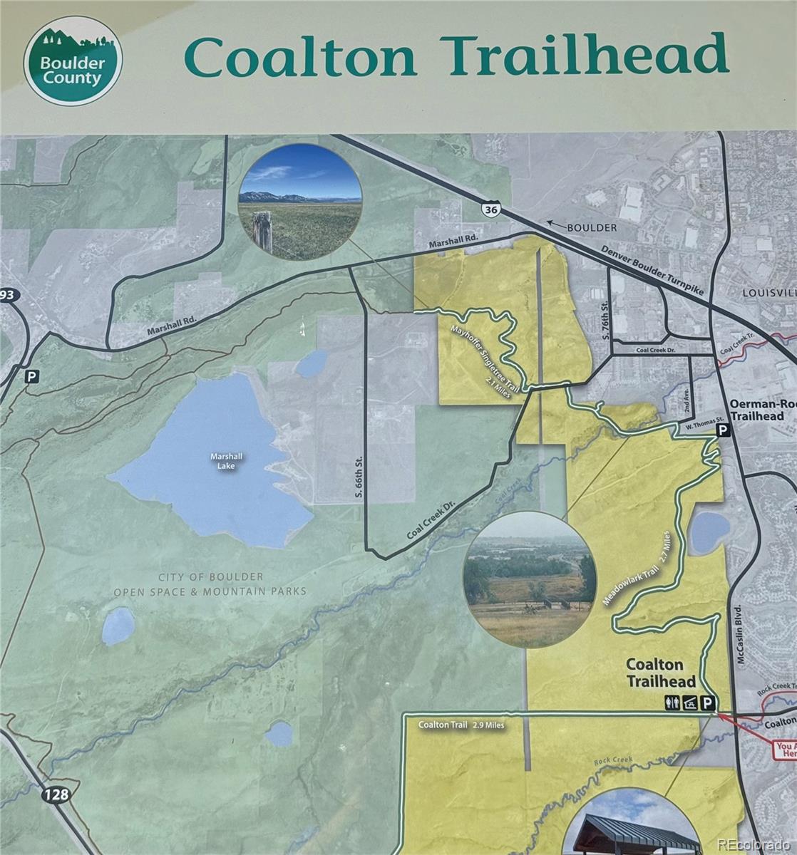 2855 Rock Creek Circle, Unit 129 Louisville, CO 80027 - Photo 33 of 45 a room with a glass shower door and glass table