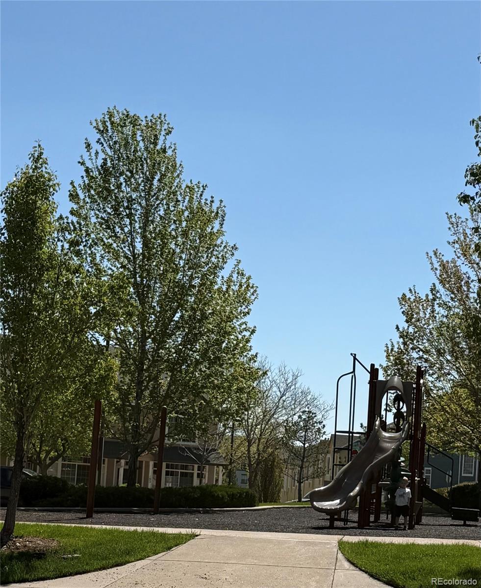 2855 Rock Creek Circle, Unit 129 Louisville, CO 80027 - Photo 43 of 45 a view of a park with large trees