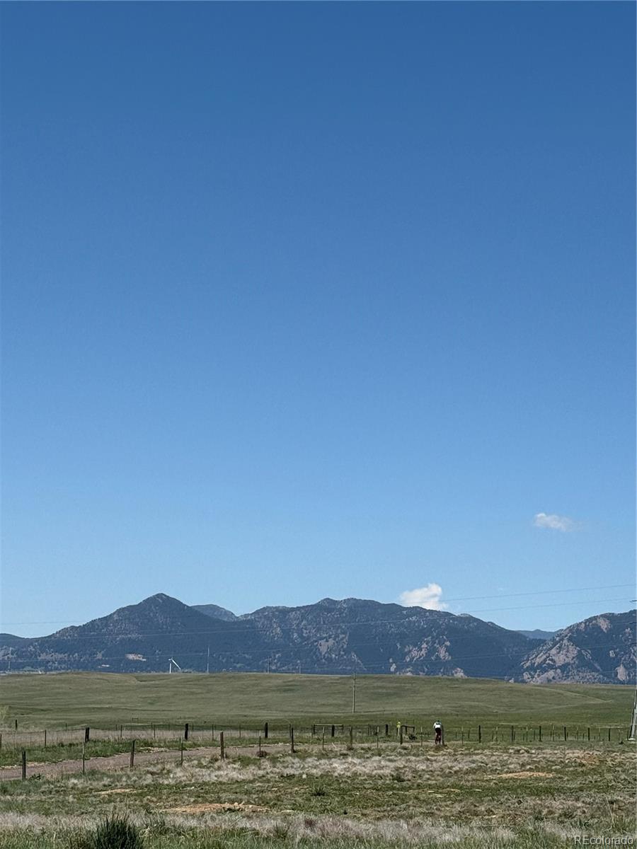 2855 Rock Creek Circle, Unit 129 Louisville, CO 80027 - Photo 45 of 45 a view of lake with mountain