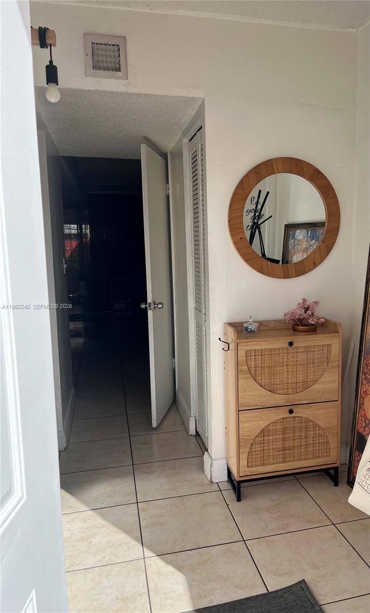 4331 West 11th Lane, Unit 65 Hialeah, FL 33012 - Photo 12 of 21 a bathroom with a sink and a mirror