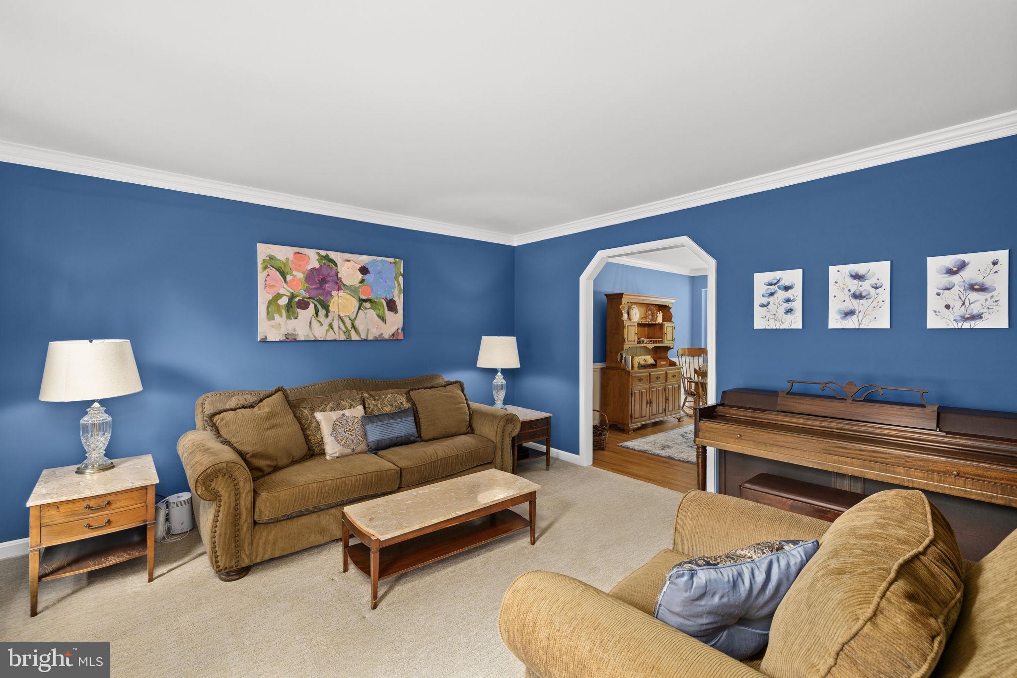 100 Boscobel Road Fredericksburg, VA 22405 - Photo 35 of 67 a living room with furniture and painting on the wall