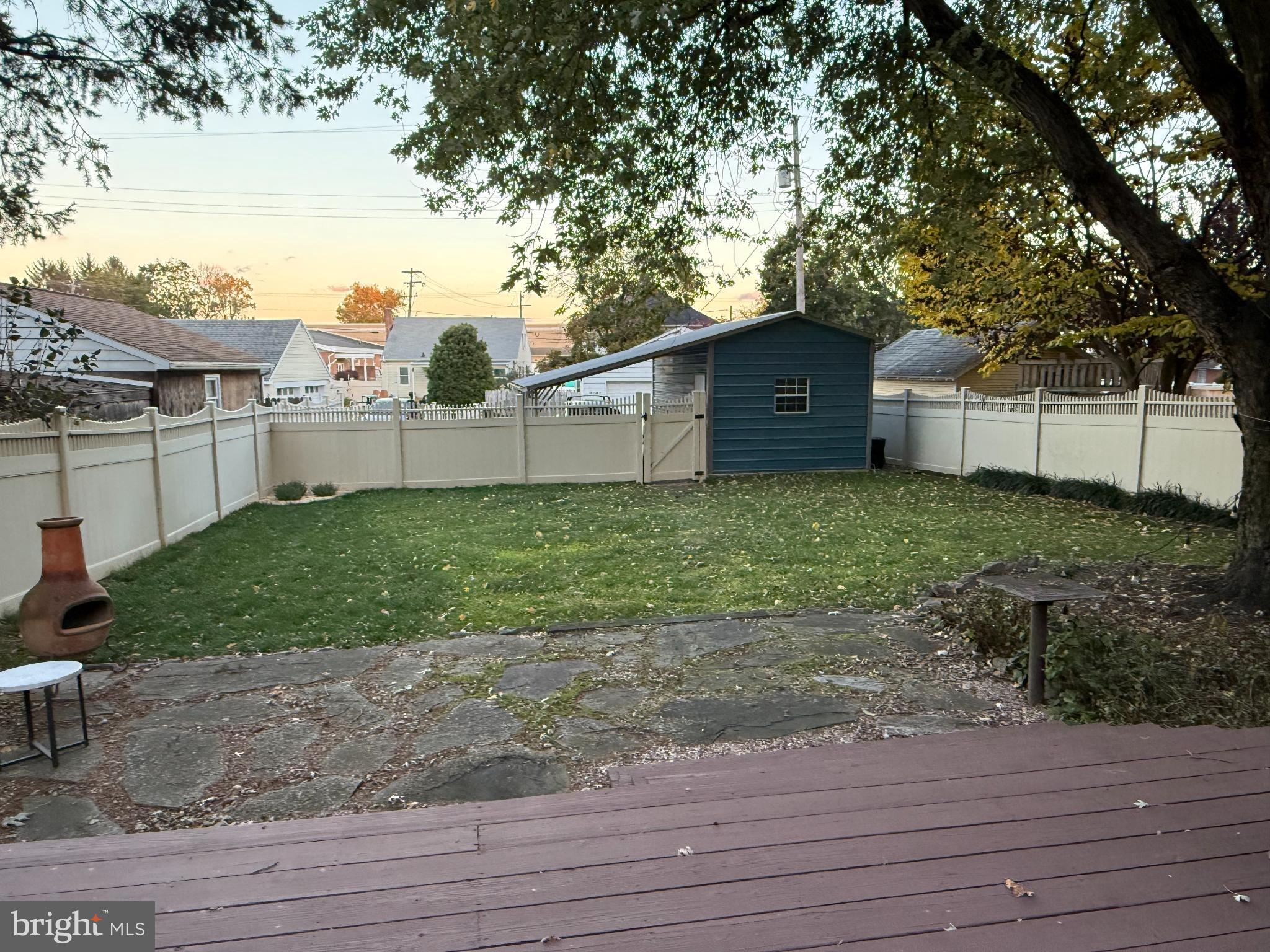 83 George Street Hanover, PA 17331 - Photo 3 of 3 a view of a yard in front of a house with a large tree
