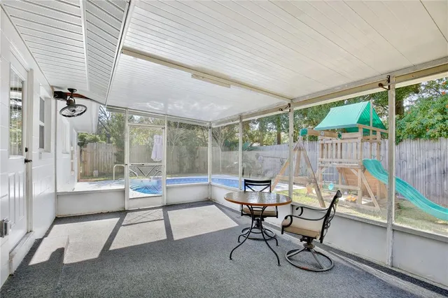 a work room with furniture and a gate
