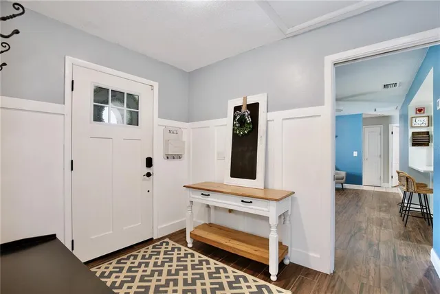 a bedroom with furniture and window