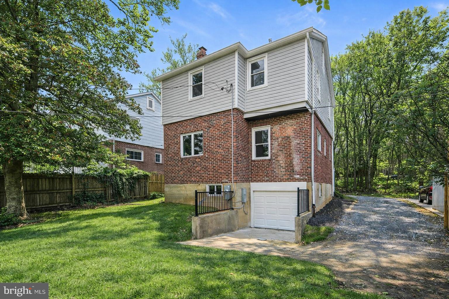 402 Westgate Road Baltimore, MD 21229 - Photo 3 of 37 front view of a house with a yard