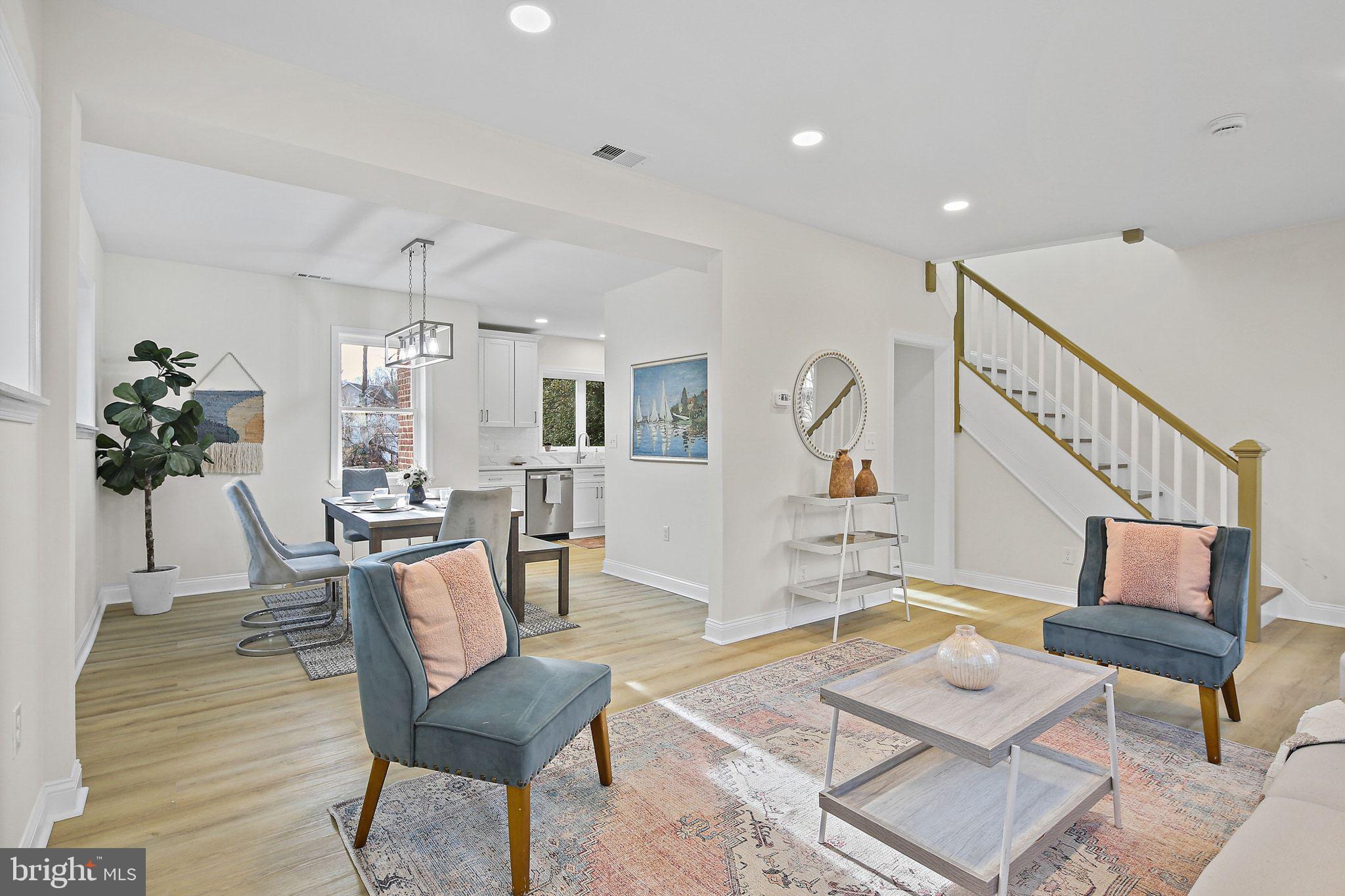 402 Westgate Road Baltimore, MD 21229 - Photo 4 of 37 a living room with furniture and wooden floor