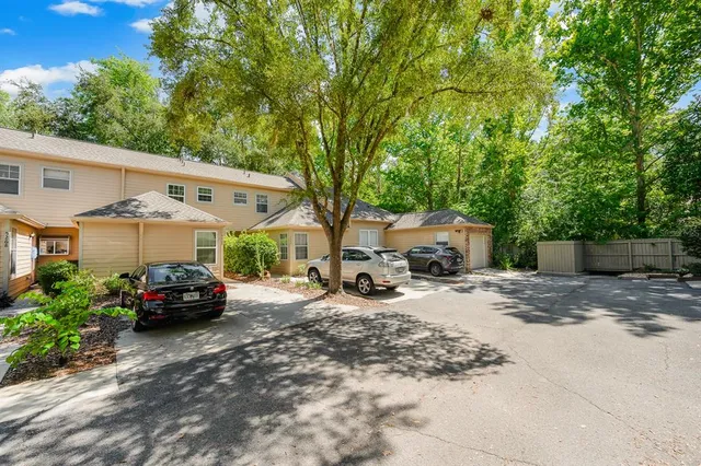 a car parked in front of a house