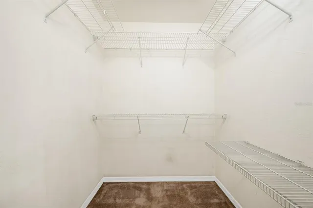 a view of a room with racks on the wall