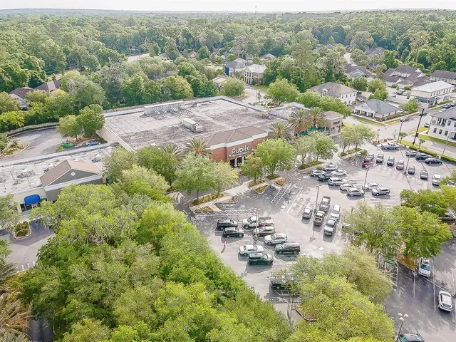 an aerial view of residential house with outdoor space